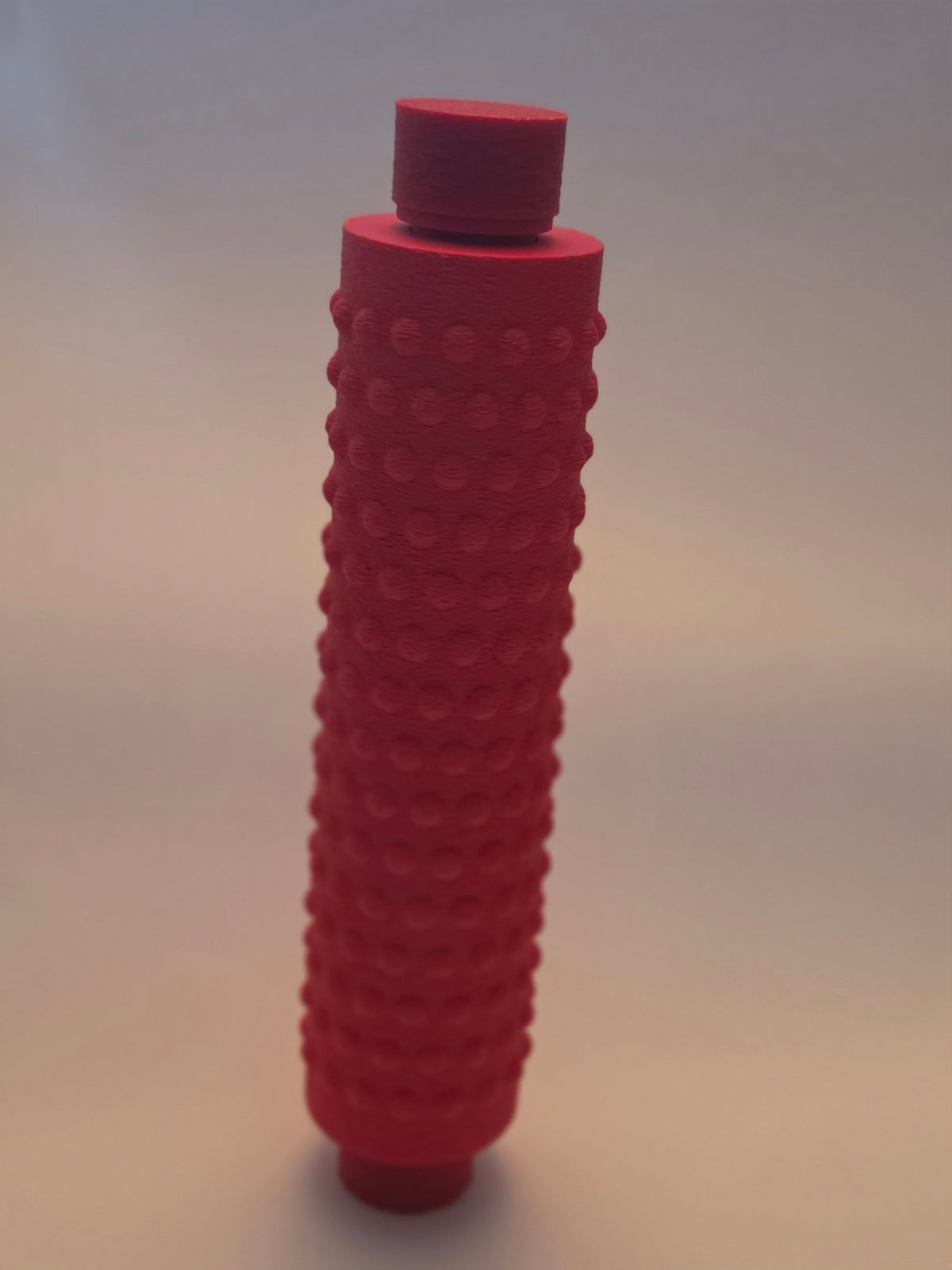 Red massage roller, top cap
